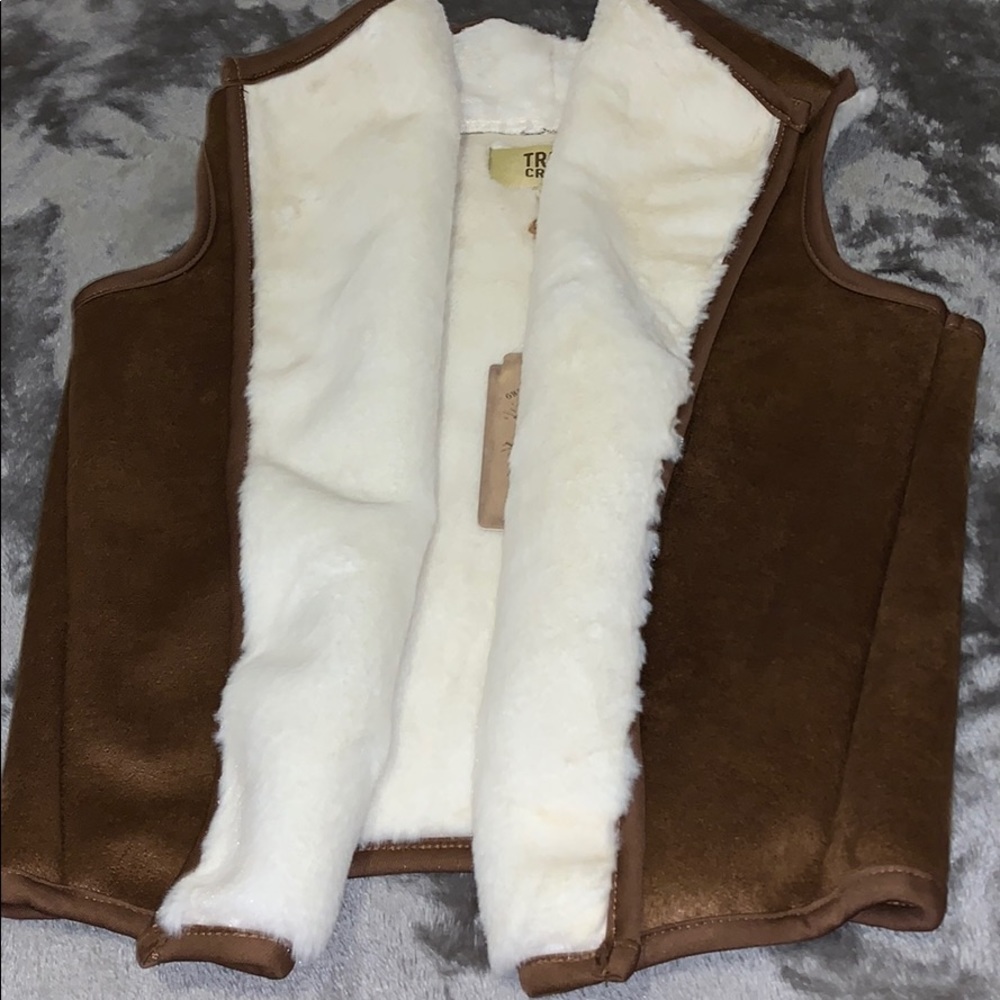 brown vest